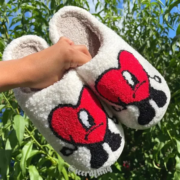 Bad Bunny just blessed his fans with a new line of slippers, and they're so cool you'll want to get them for all your friends and family.